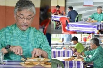 agong makan roti tempayan